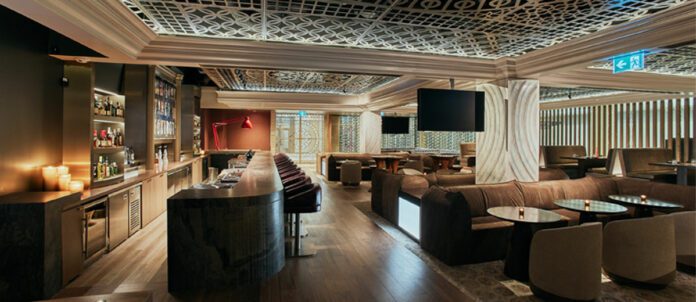 Photo of Bright Blue Bovine near bar and lounge area